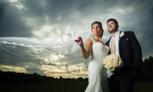 bride-and-groom-pose-at-sunset