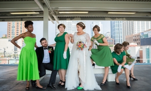 bridal-party-posing-at-train-station