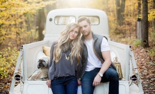 couple in back of old truck